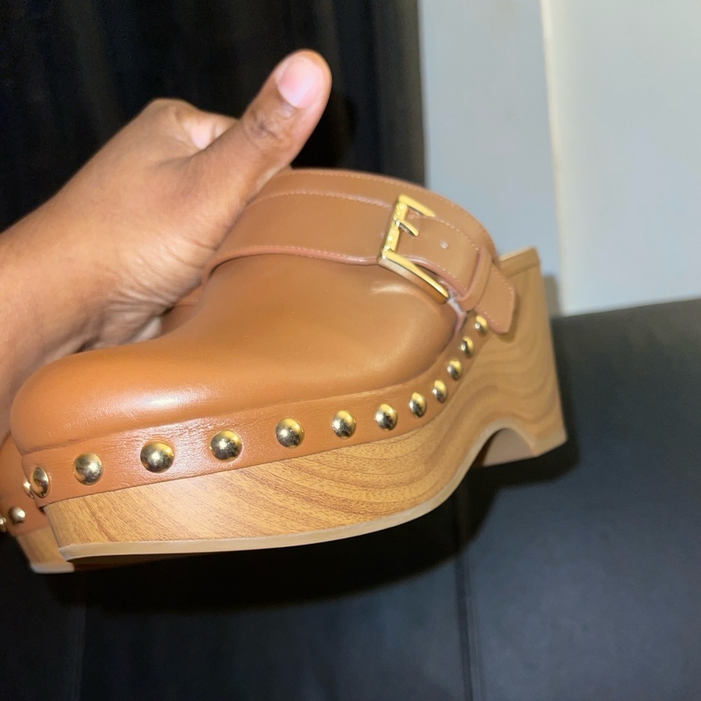 Michael Kors
Michael Kors Rye Clog
Luggage Women’s Size 6.5 NWOB - Picture 9 of 16